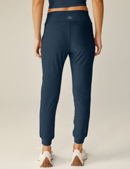 blue high-waisted jogger with pockets.