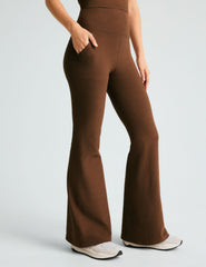 brown high-waisted flare pants with side pockets.