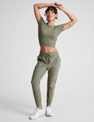 green midi length joggers with a drawstring in waistband and pockets.
