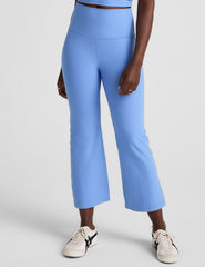 blue high-waisted cropped flare pants.