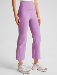purple high-waisted flare cropped pants.