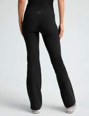 black high-waisted flare leggings with front side pockets.