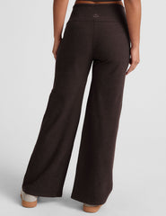 brown mid-rise wide leg pants with pockets.