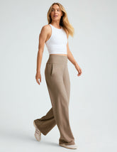 brown high-waisted short length pants with pockets.