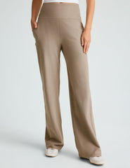 brown high-waisted straight leg pants.