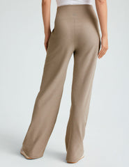 brown high-waisted straight leg pants.