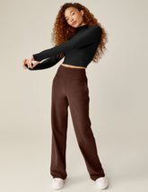 brown high-waisted wide leg pants with pockets.