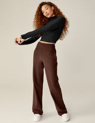 brown high-waisted wide leg pants with pockets.