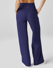 blue high-waisted pants with pockets.
