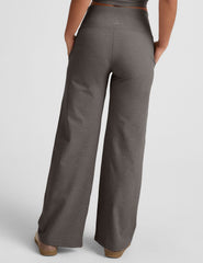 grey high-waisted wide leg pants with pockets.