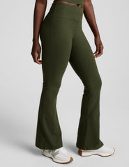 green mid-rise bootcut pants.