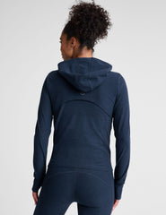 blue zip-up hooded jacket with thumbholes.