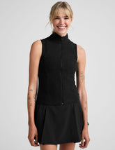 black zip-up vest with a mesh upper back detail.