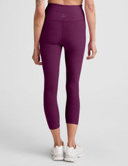 purple high-waisted capri length leggings.