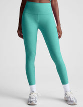 blue high-waisted midi length leggings.