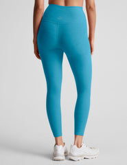 blue high-waisted midi length leggings.
