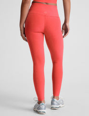 pink high-waisted midi length leggings.