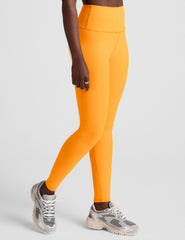 orange high-waisted midi length leggings.