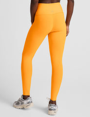 orange high-waisted midi length leggings.