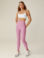 pink high-waisted midi leggings.
