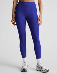 blue high-waisted midi length leggings.