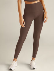 brown high-waisted midi leggings.