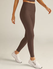 brown high-waisted midi leggings.