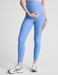 blue maternity midi length leggings with pockets.