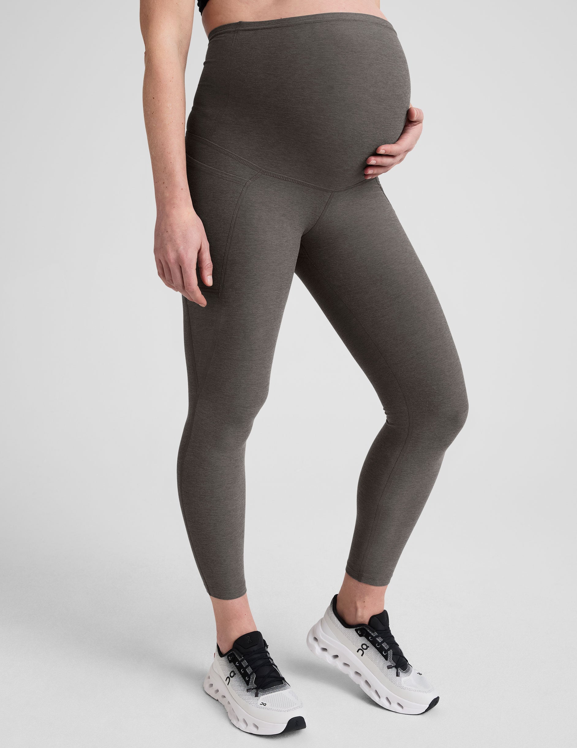 grey midi length maternity leggings with side pockets.