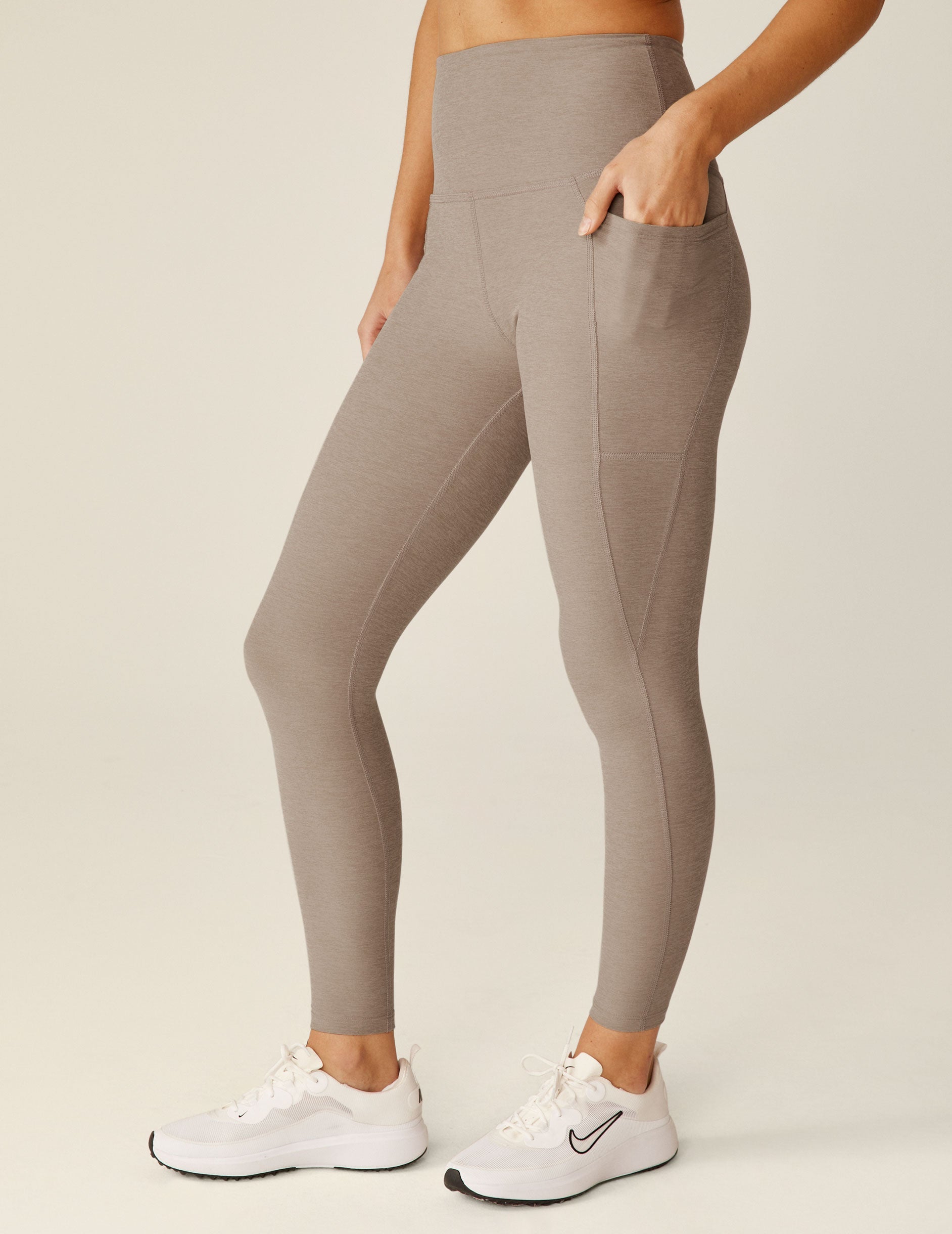 brown high-waisted midi pocket leggings.
