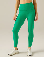 green midi legging with pocket detail at sides