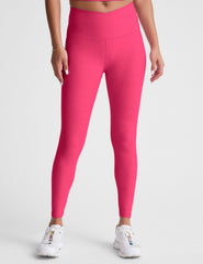 pink high-waisted midi length leggings with a crossover detail on the front waistband.