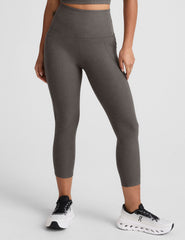 gray high-waisted capri length leggings with pockets.