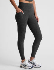 black-charcoal high-waisted midi leggings with side pockets.