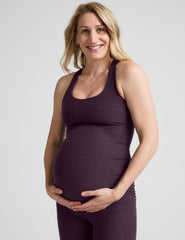 purple maternity racerback tank top and purple maternity midi length leggings.