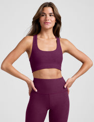 purple long line style racerback bra.