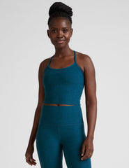 blue racerback cropped tank top with slim straps.