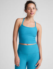 blue racerback cropped tank top with spaghetti straps.