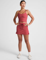 red racerback cropped tank with slim straps.