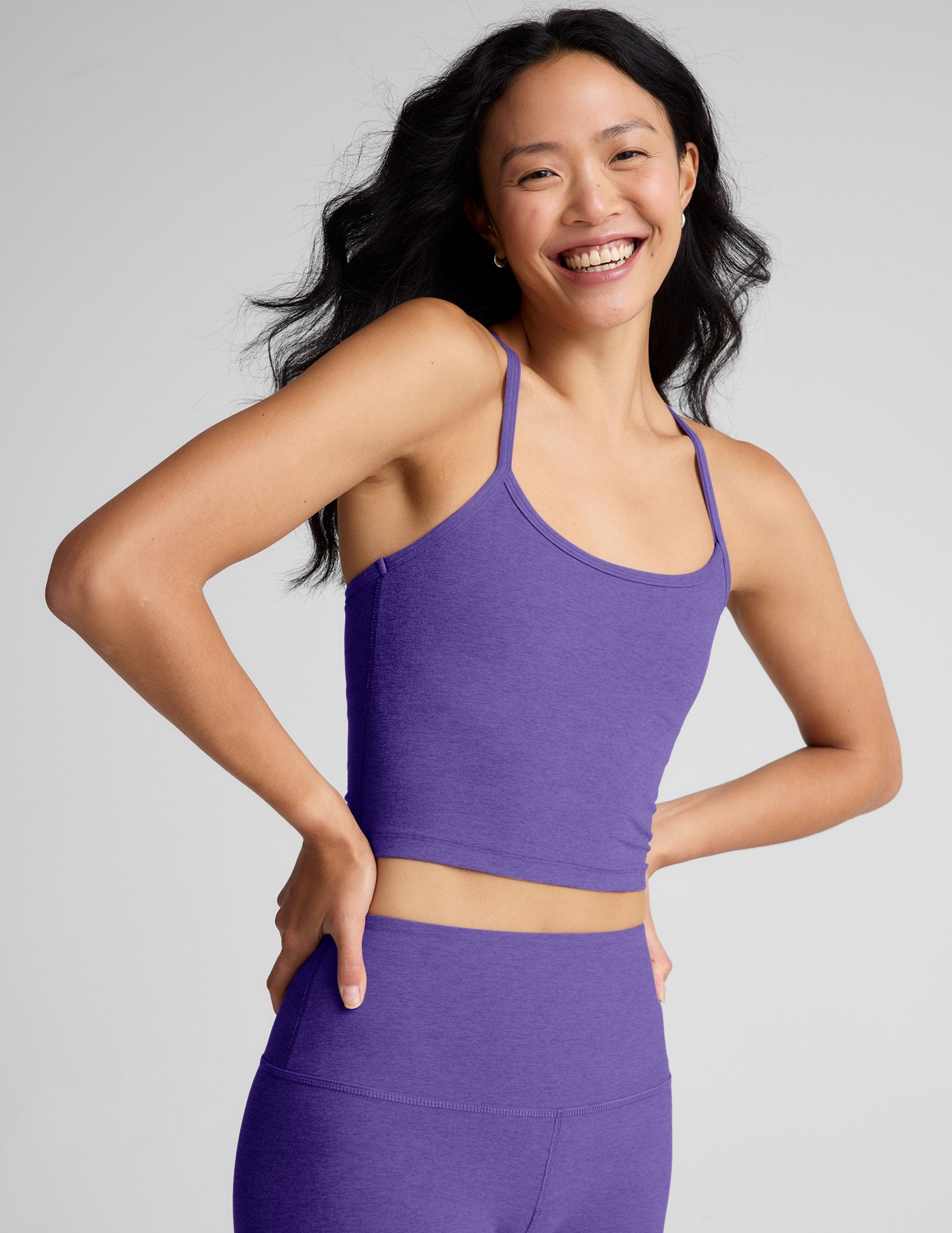 purple racerback cropped tank top with slim straps.