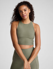 green racerback cropped tank with a high scoop neckline.