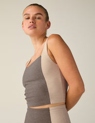 brown square neck cropped tank top with white lining on the sides.