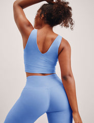 blue v-neck cropped tank top.