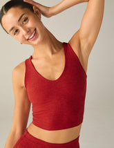 red cropped tank top with a front and back v-line.