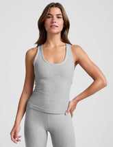 grey midway length racerback tank with white contrast trim.