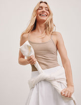 brown waist length tank top with adjustable straps.