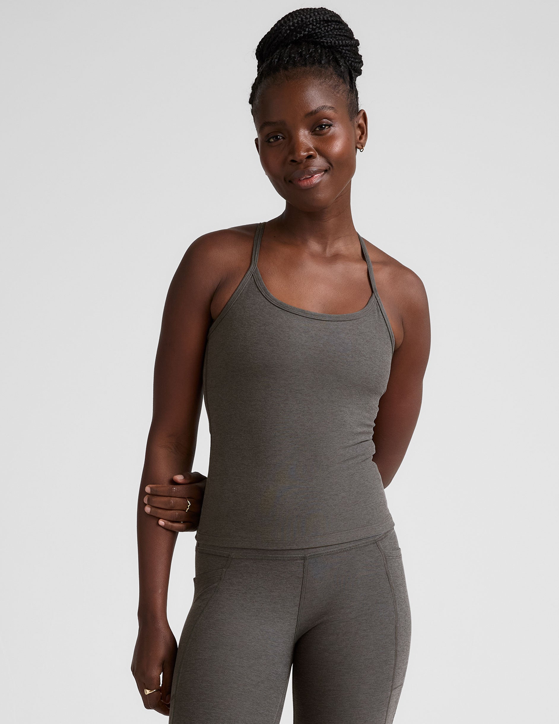 gray waist length racerback tank with slim straps.