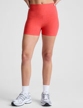 pink high-waisted 3" inseam biker shorts.