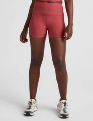 red high-waisted, 3" inseam biker shorts.