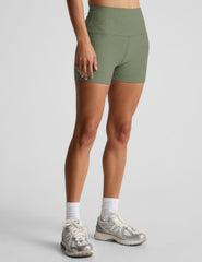green high-waisted 3" inseam biker shorts.